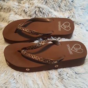 Brown flip flops